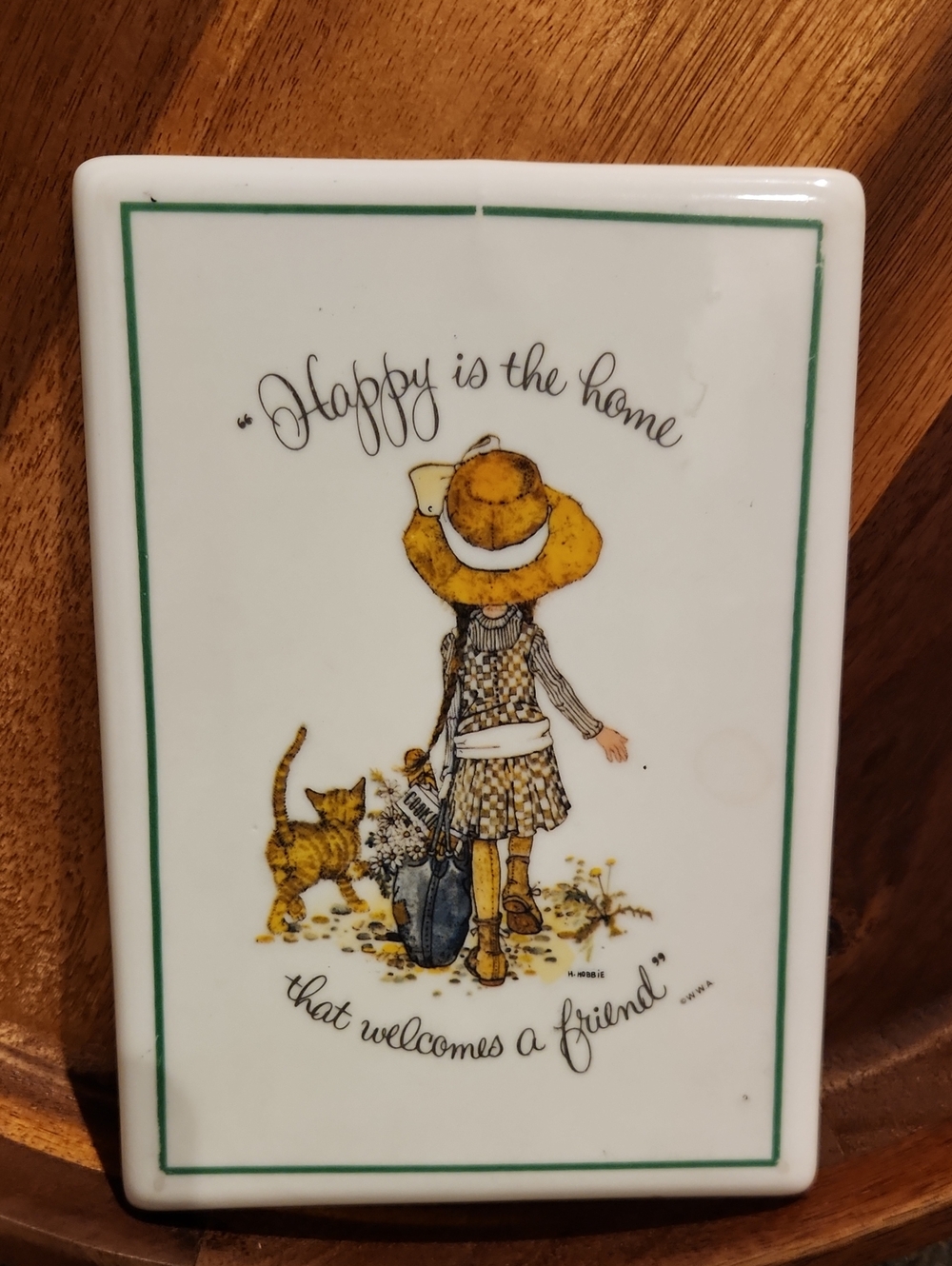 Vintage 1973 Holly Hobbie porcelain wall plaque.